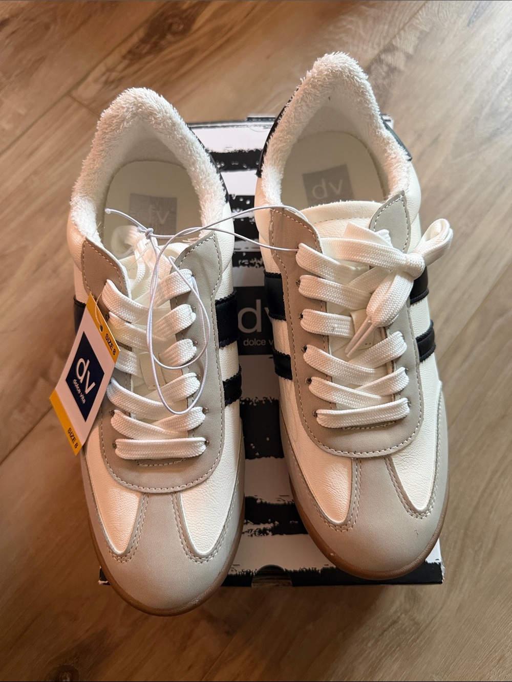 DV by Dolce Vita Cream and Black Lace-Up Sneakers